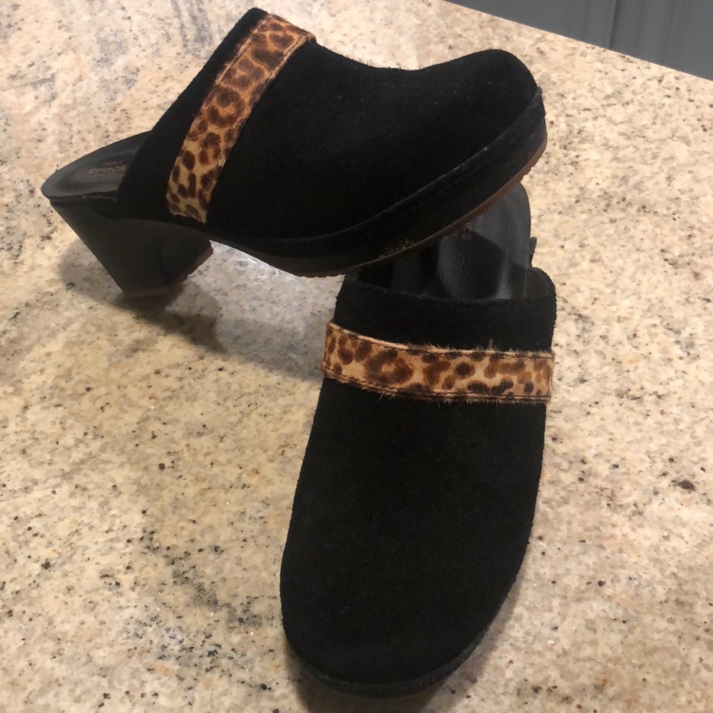Black suede Crocs with cheetah band .